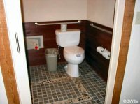 Bathroom with doors partially closed