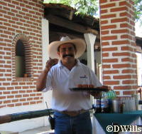 Jorge offers tequila