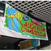 Laugh Floor Comedy Club  Now Playing Sign